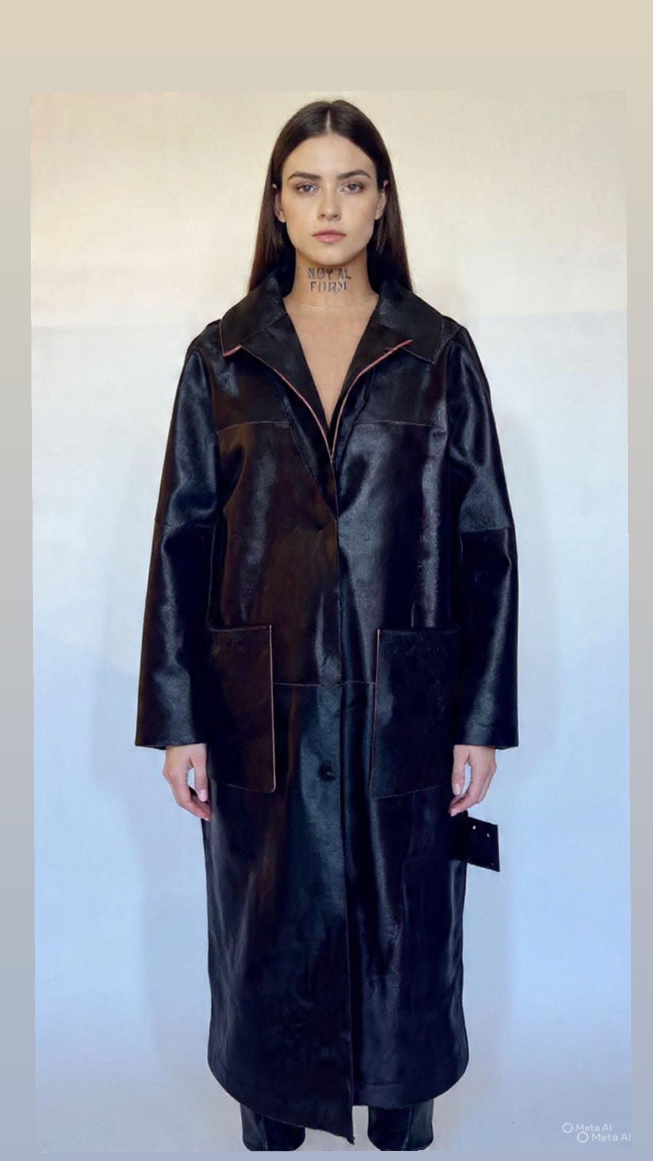 Burgundy Hair-On Leather Coat: Oversized Handmade Cavallino Calf full length with slits on the sides.