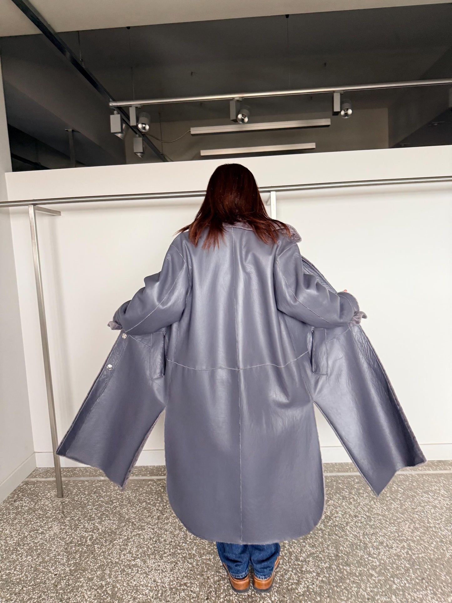 Reversible grayish merino shearling and leather coat: Super warm and silky soft Argento Sheepskin stroller.