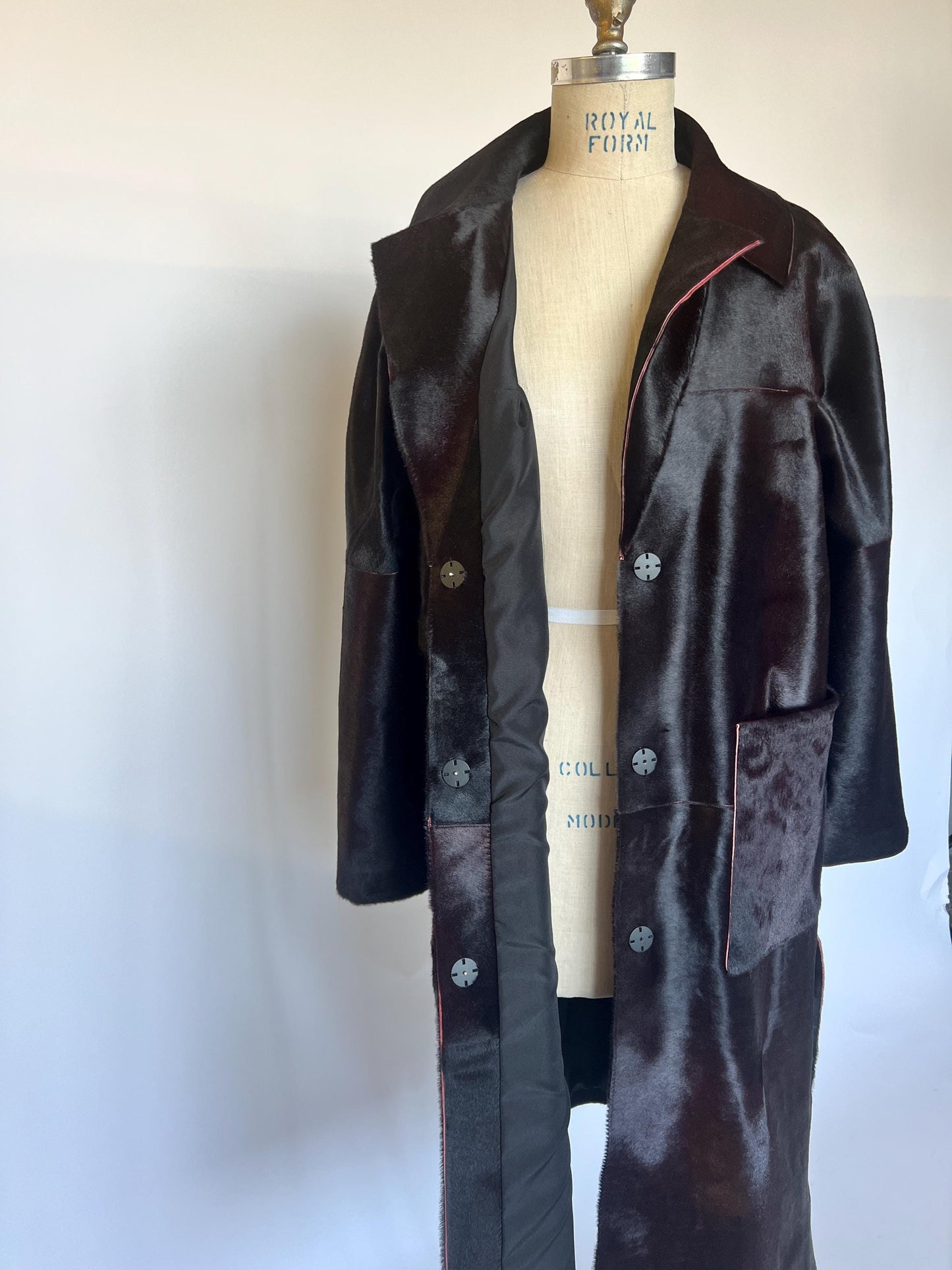 Burgundy Hair-On Leather Coat: Oversized Handmade Cavallino Calf full length with slits on the sides.