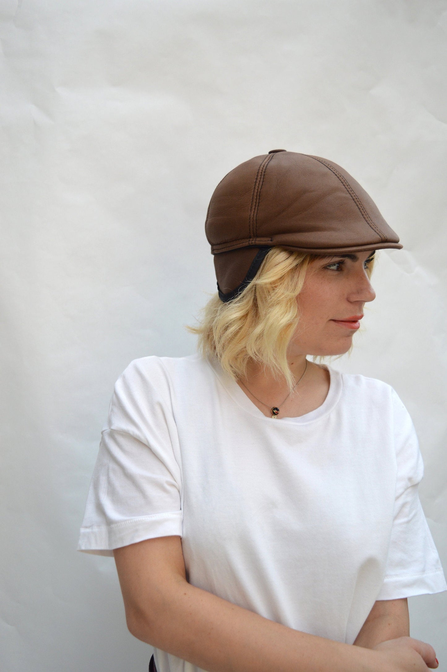 Shearling Equestrian Cap: Sheepskin Cloche Hat with Ear Flaps