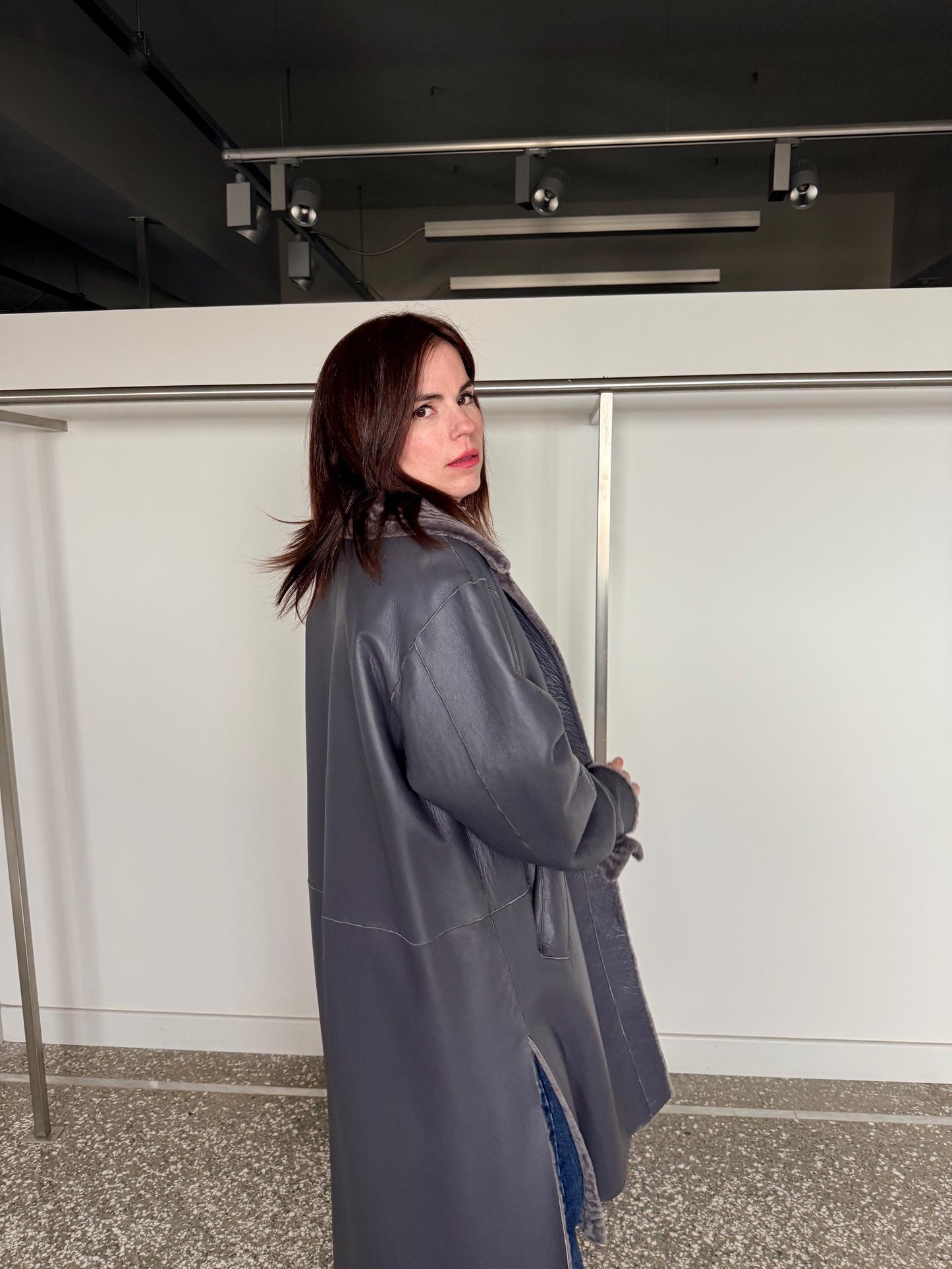 Reversible grayish merino shearling and leather coat: Super warm and silky soft Argento Sheepskin stroller.