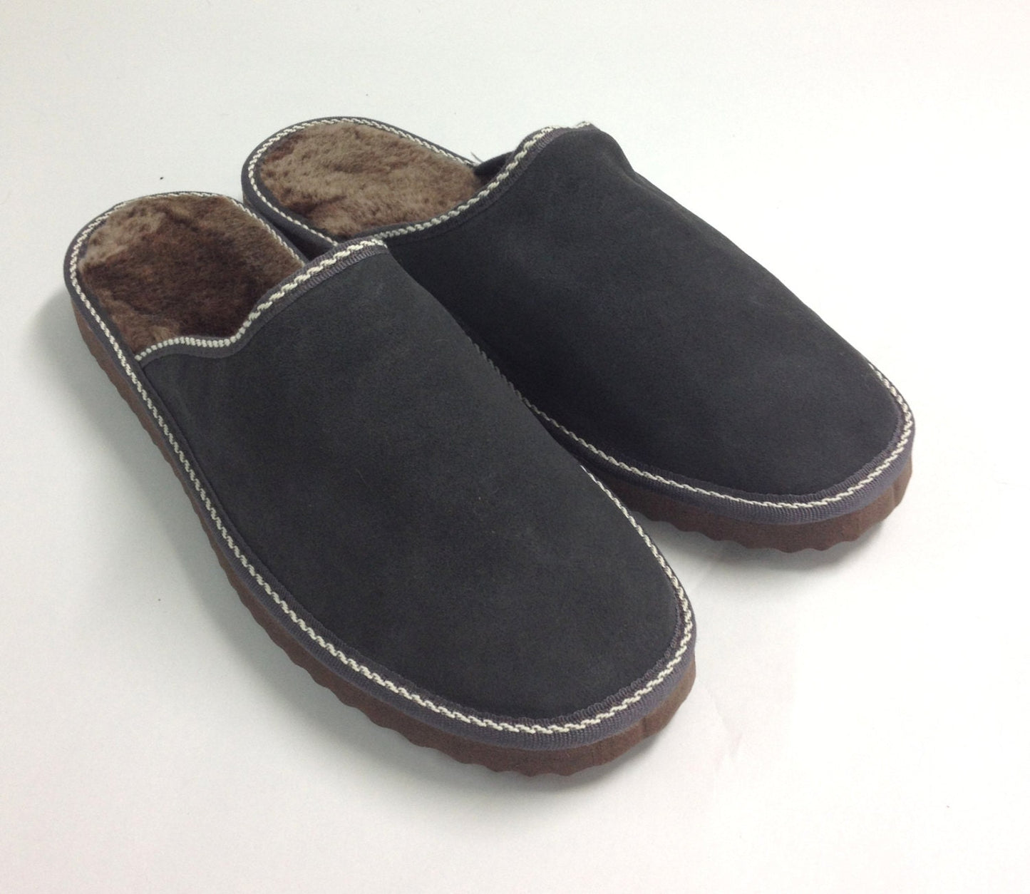 Genuine shearling fur slippers for men.