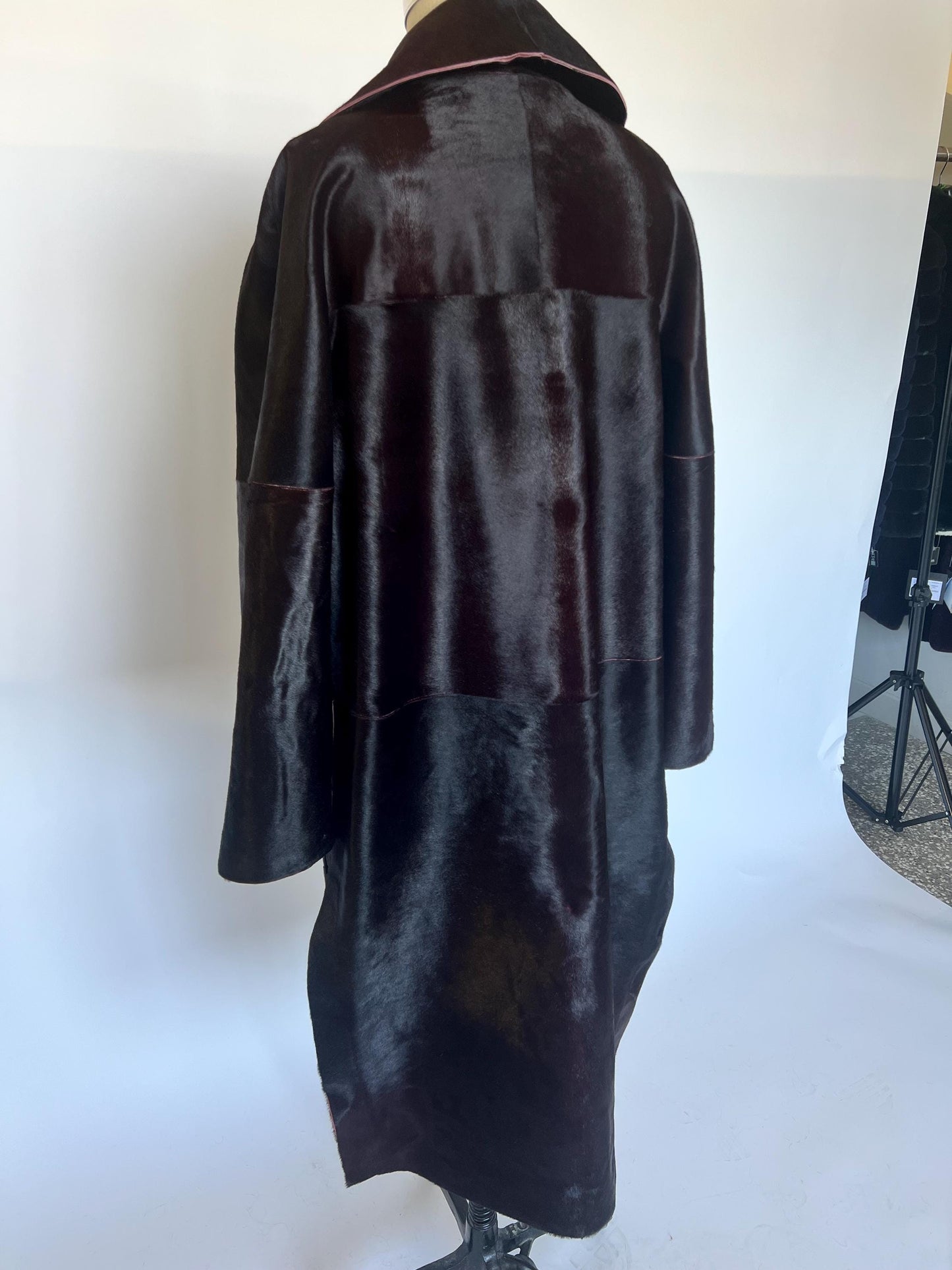 Burgundy Hair-On Leather Coat: Oversized Handmade Cavallino Calf full length with slits on the sides.