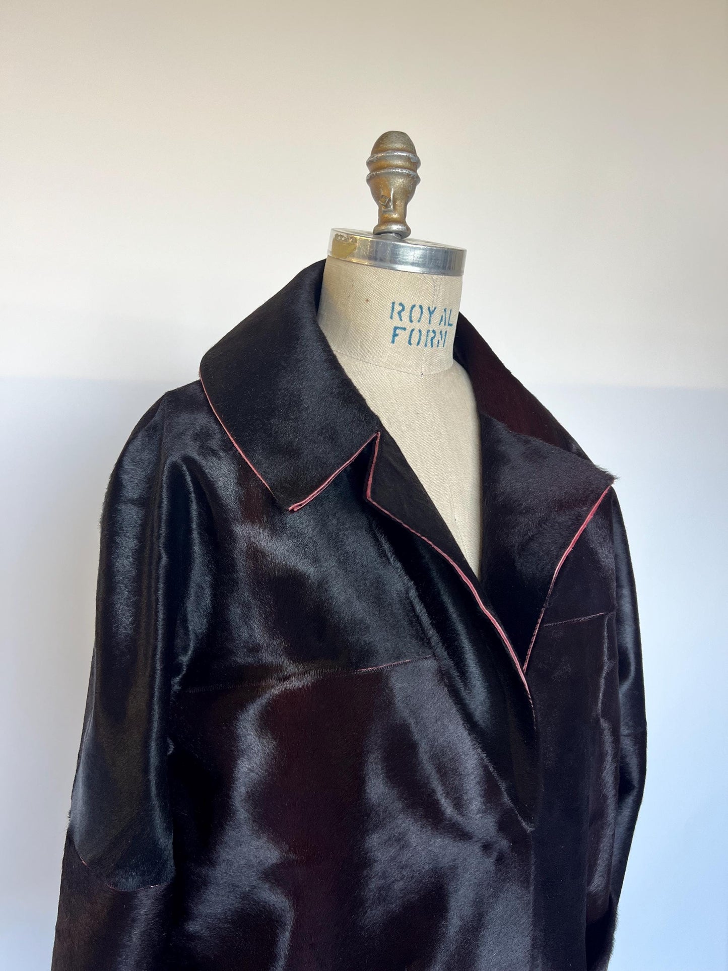 Burgundy Hair-On Leather Coat: Oversized Handmade Cavallino Calf full length with slits on the sides.