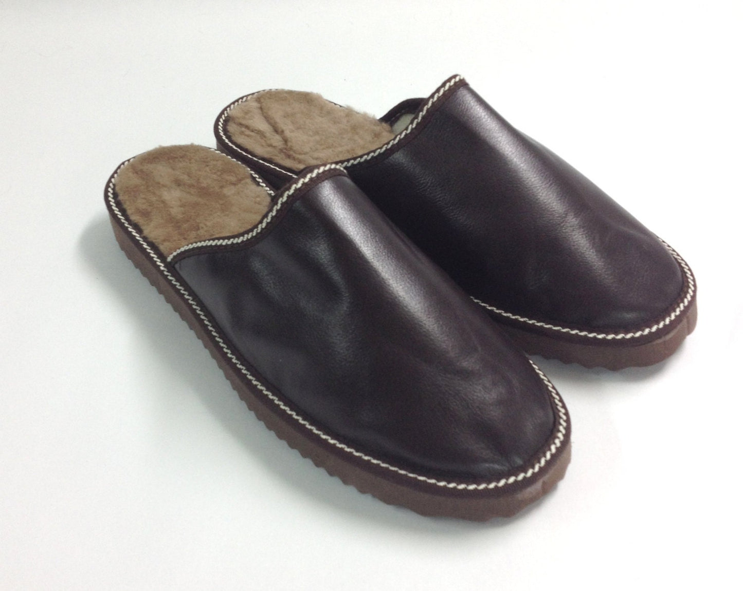 Genuine shearling slippers for men.