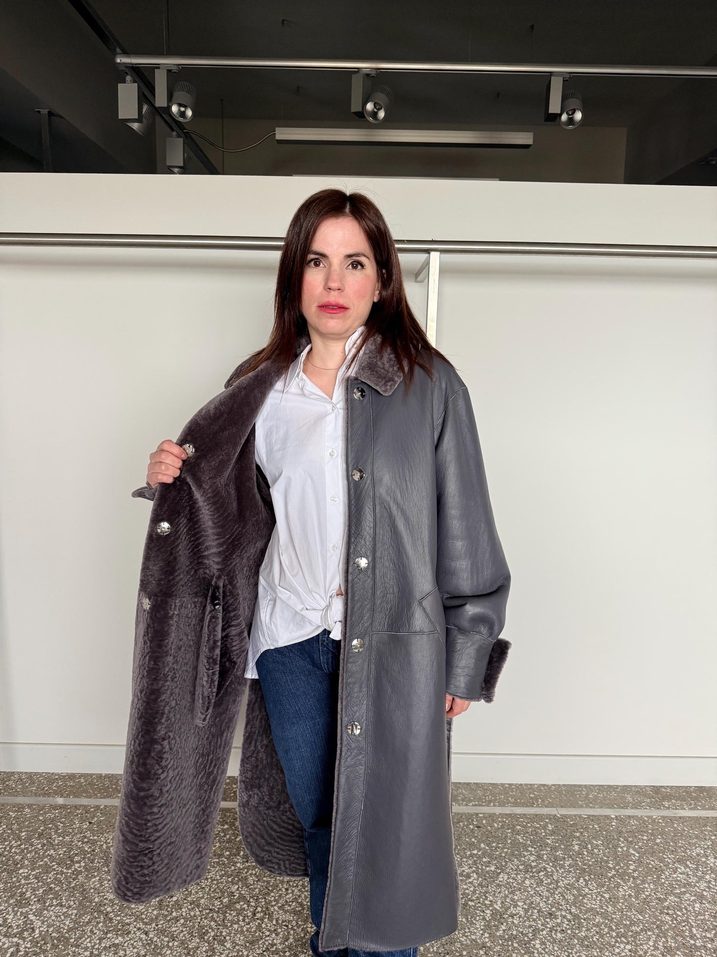 Reversible grayish merino shearling and leather coat: Super warm and silky soft Argento Sheepskin stroller.