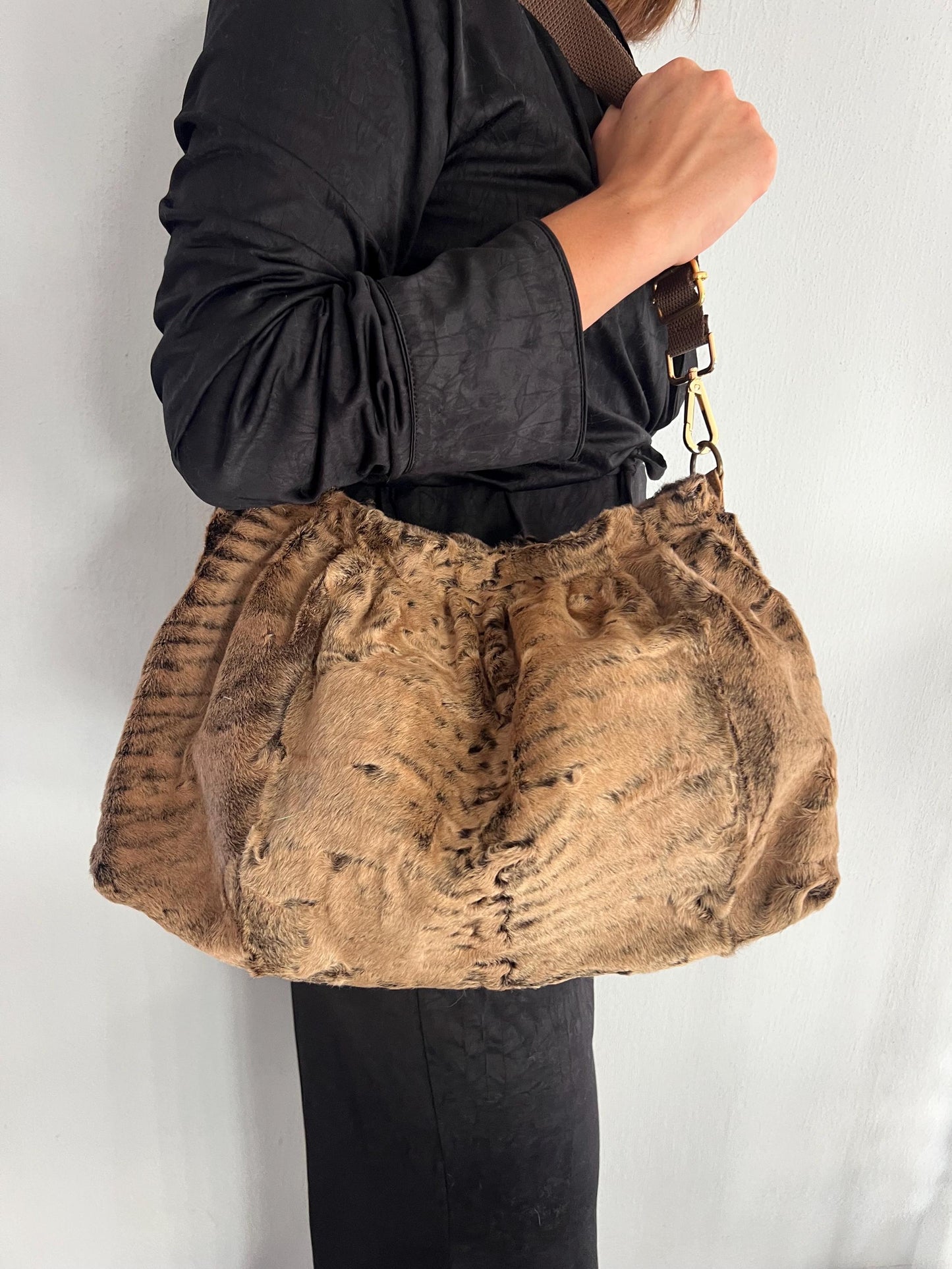 Rusty brown lamb fur Slouch Bag: Swakara Handmade brown Strap Crossbody with lining.