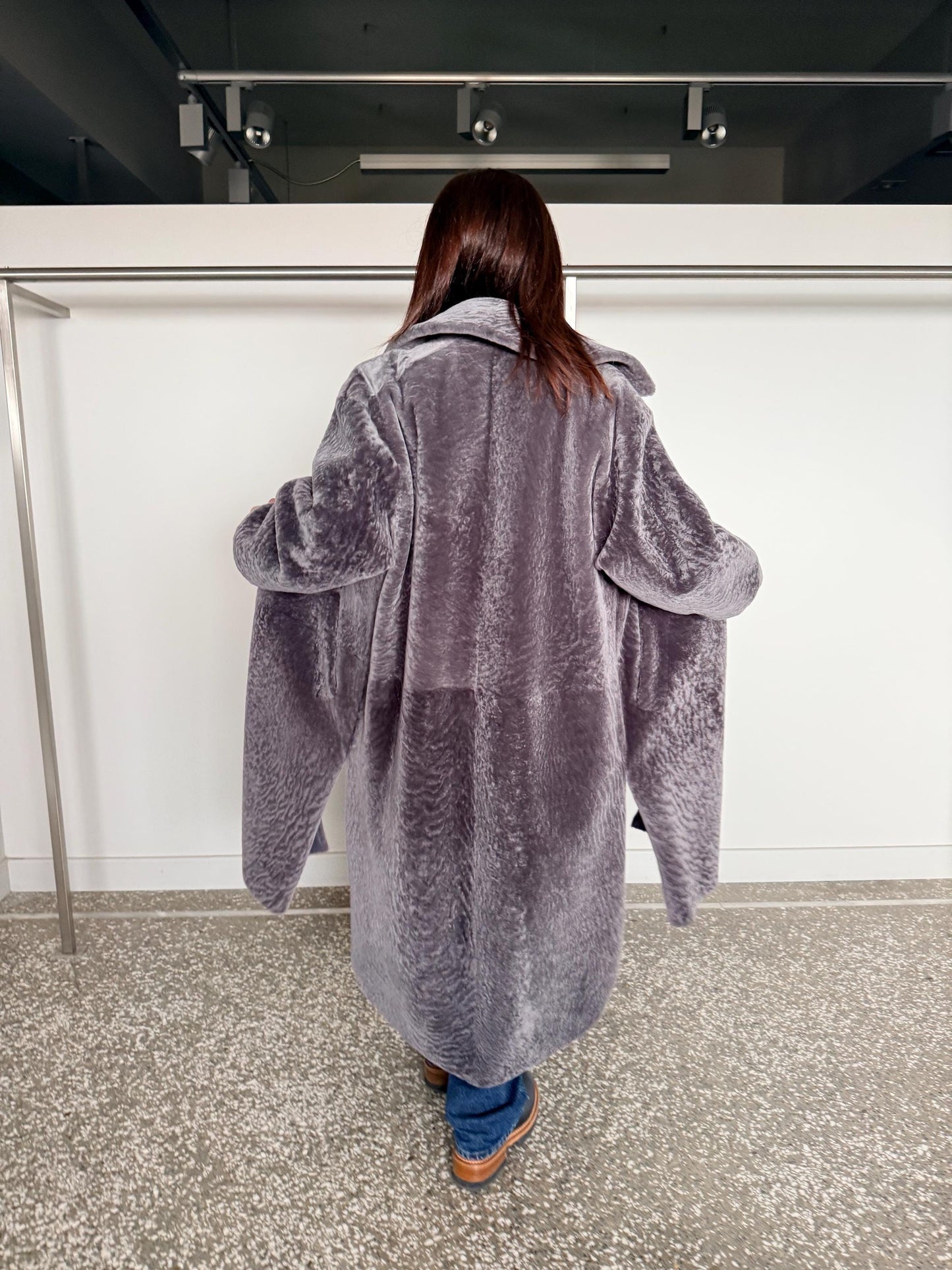 Reversible grayish merino shearling and leather coat: Super warm and silky soft Argento Sheepskin stroller.