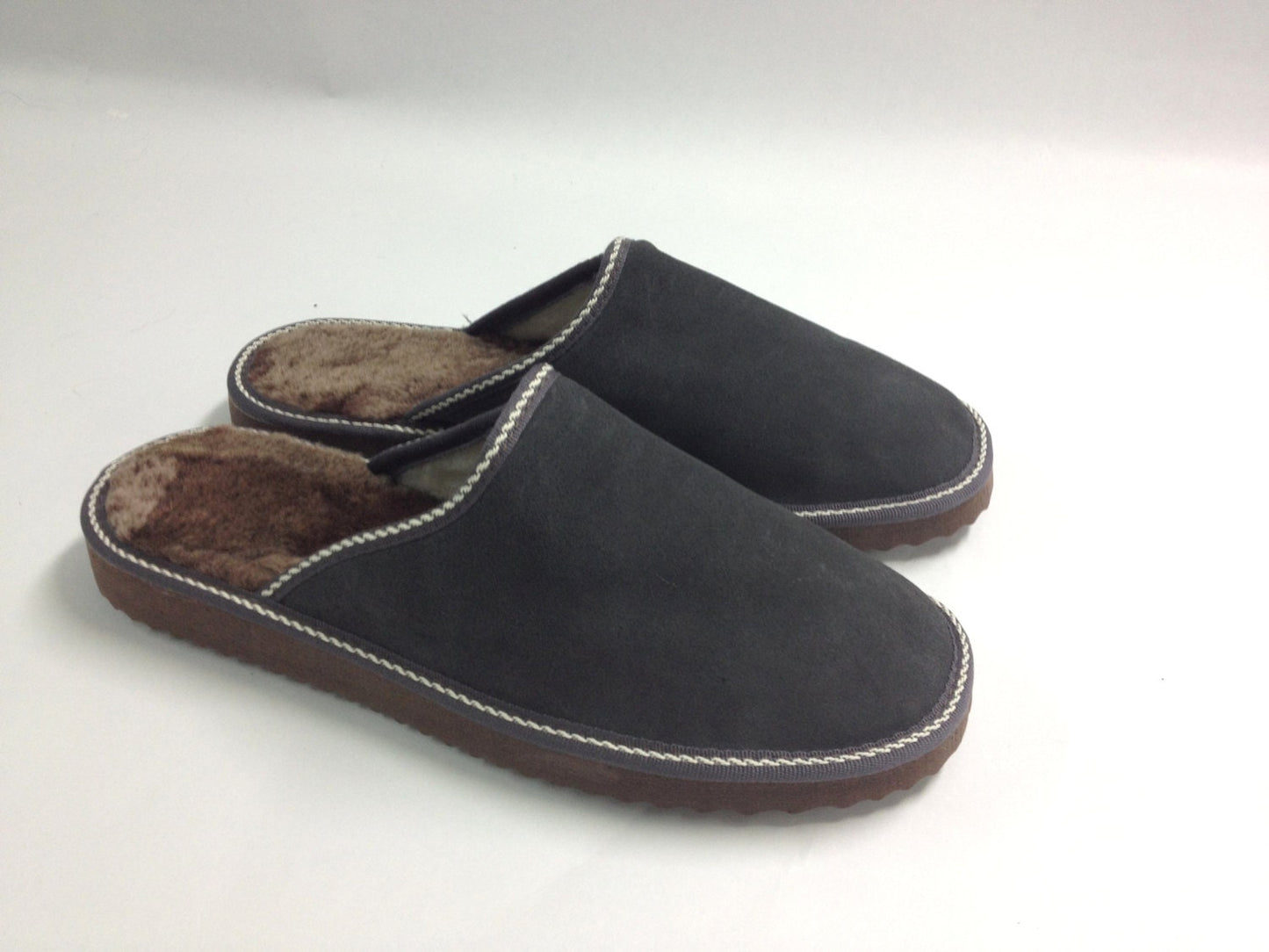 Genuine shearling fur slippers for men.