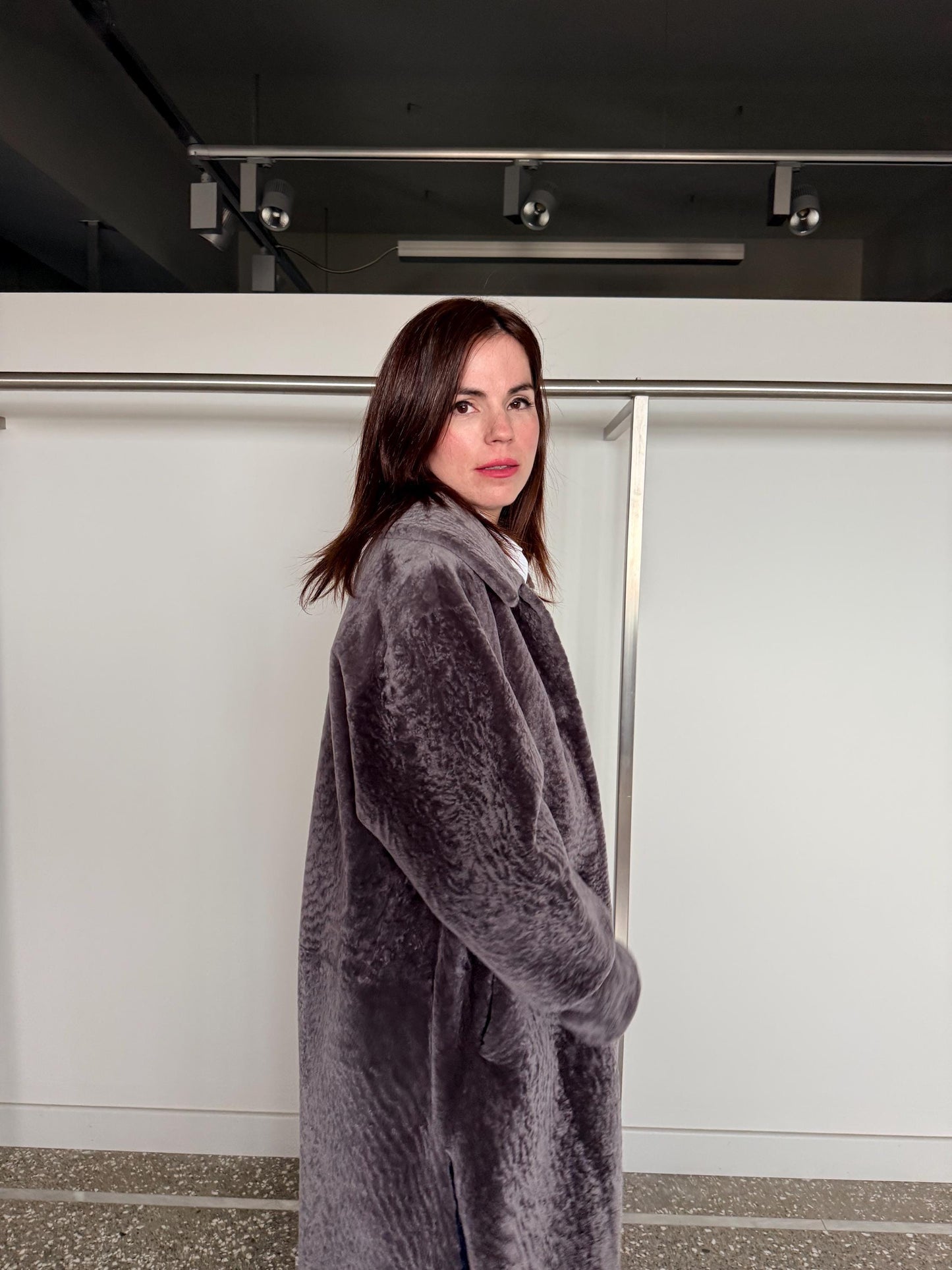 Reversible grayish merino shearling and leather coat: Super warm and silky soft Argento Sheepskin stroller.