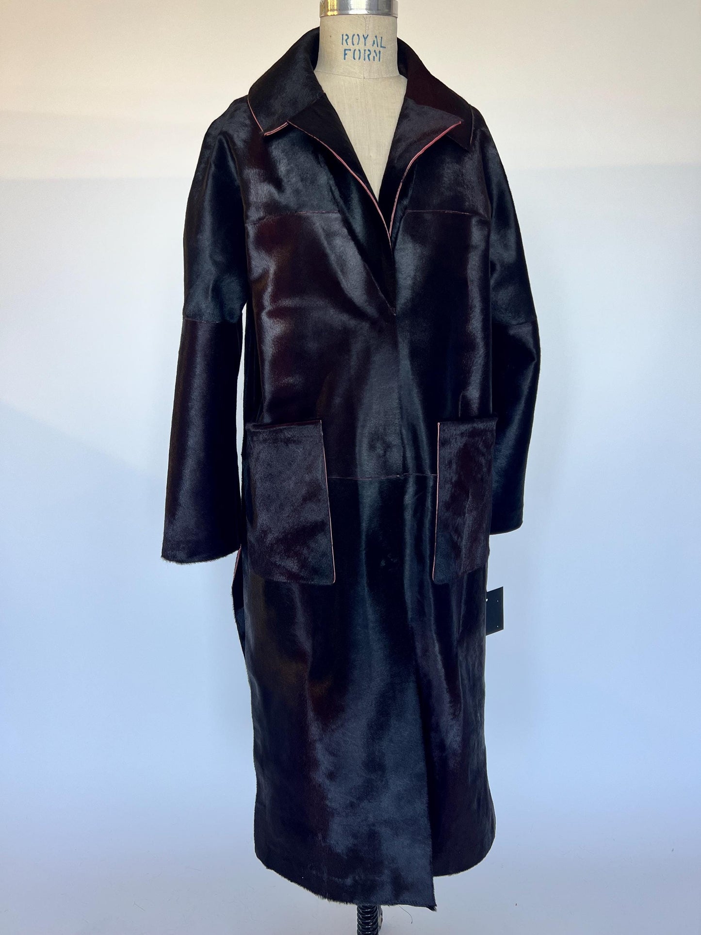 Burgundy Hair-On Leather Coat: Oversized Handmade Cavallino Calf full length with slits on the sides.